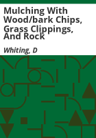 Mulching_with_wood_bark_chips__grass_clippings__and_rock